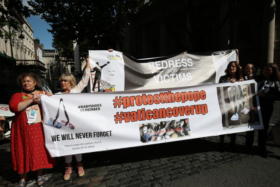 Protesters call for redress for victims of Catholic Church clerical sex abuses, during a protest they held during Pope Francis' visit to Ireland, in Dublin, Ireland, Saturday, Aug. 25, 2018. The pontiff is traveling to Ireland for a two-day visit on the occasion of the 2018 World Meeting of Families. (Aaron Chown//PA via AP)