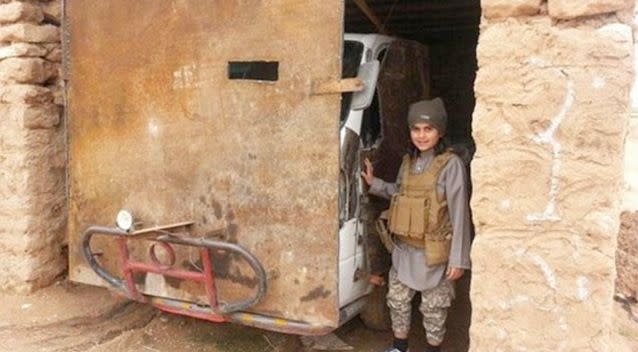 The Cub of Baghdadi is pictured smiling as he stands next to a vehicle. Photo: Twitter