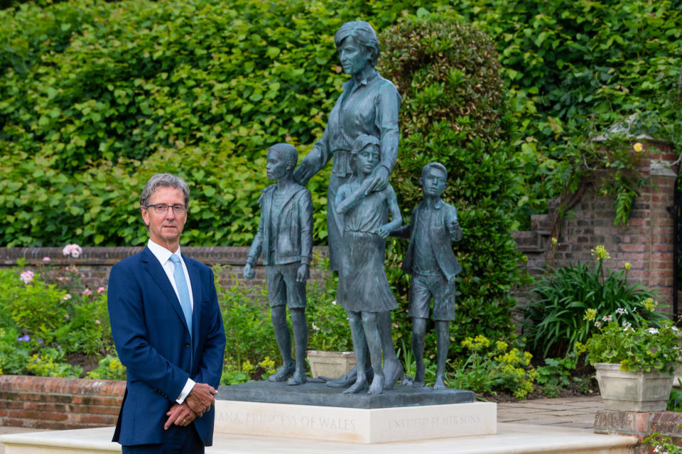 LONDON, ENGLAND - JULY 01: Sculptor, Ian Rank-Broadley poses with his Diana, Princess of Wales statue in the Sunken Garden at Kensington Palace, following the unveiling on July 1, 2021 in London, England. Today would have been the 60th birthday of Princess Diana, who died in 1997. At a ceremony here today, her sons Prince William, Duke of Cambridge and Prince Harry, Duke of Sussex unveiled a statue in her memory. (Photo by Dominic Lipinski - WPA Pool/Getty Images)