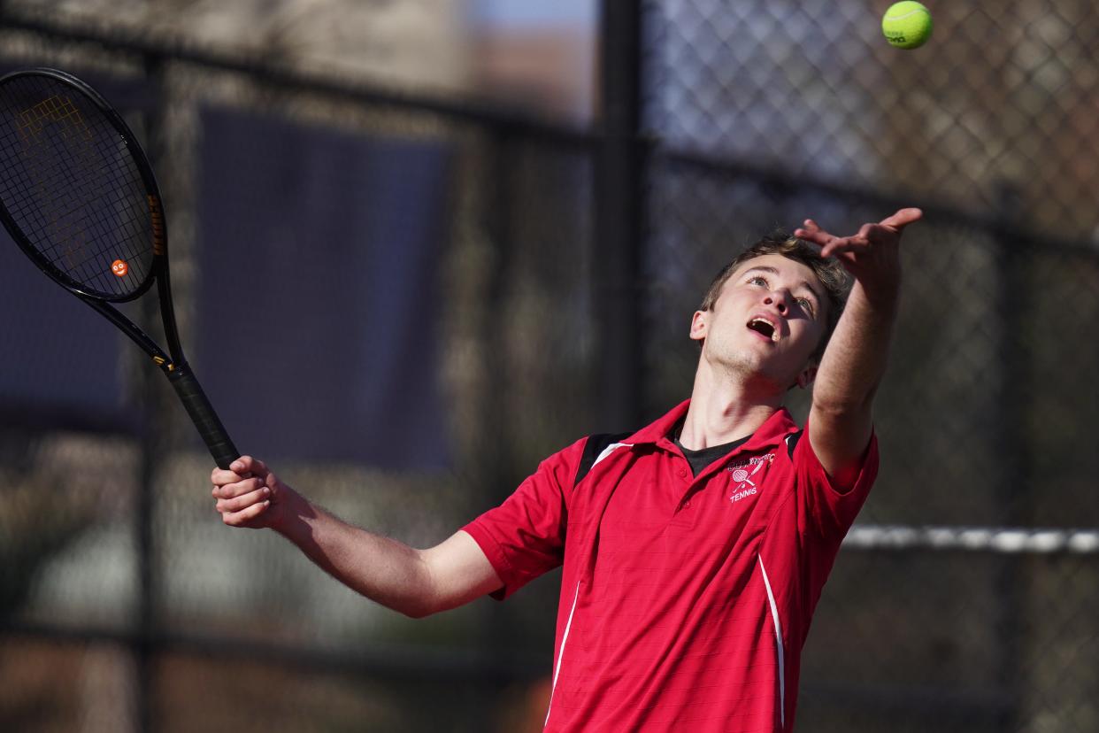 Coventry's Andrew Travison prepares to serve late in the first set during his match at No. 2 singles Wednesday against Central. Travison came up with a straight sets win, helping the Oakers get back to .500 with a win over the Knights.