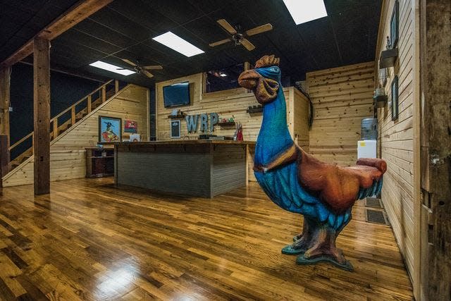 Harriet, the mascot for Western Reserve Playhouse, stands near the bar area for the theater. Harriet came from the Goodyear Community Theater.