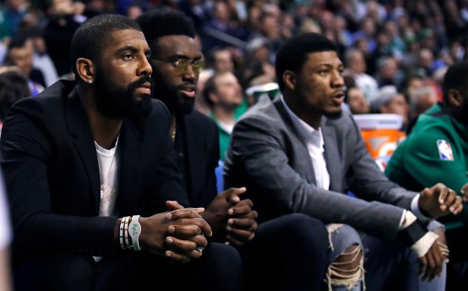Danny Ainge explained that Kyrie Irving had a good reason for missing Sunday’s Game 7 after his absence drew criticism. (AP)