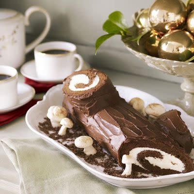 <p>Pay tribute to the Yuletide when you make a Caramel Bûche de Noël (French for "Yule Log"), which is filled with dulce de leche filling and a milk chocolate frosting This decadent dessert will make you the classiest baker on the block. </p><p><em><a href="https://www.womansday.com/food-recipes/food-drinks/recipes/a31425/caramel-buche-noel-recipe-ghk1210/" rel="nofollow noopener" target="_blank" data-ylk="slk:Get the recipe.;elm:context_link;itc:0;sec:content-canvas" class="link ">Get the recipe.</a></em></p>