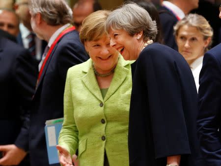 British Prime Minister Theresa May and German Chancellor Angela Merkel attend the EU summit in Brussels, Belgium, June 22, 2017. REUTERS/Francois Lenoir