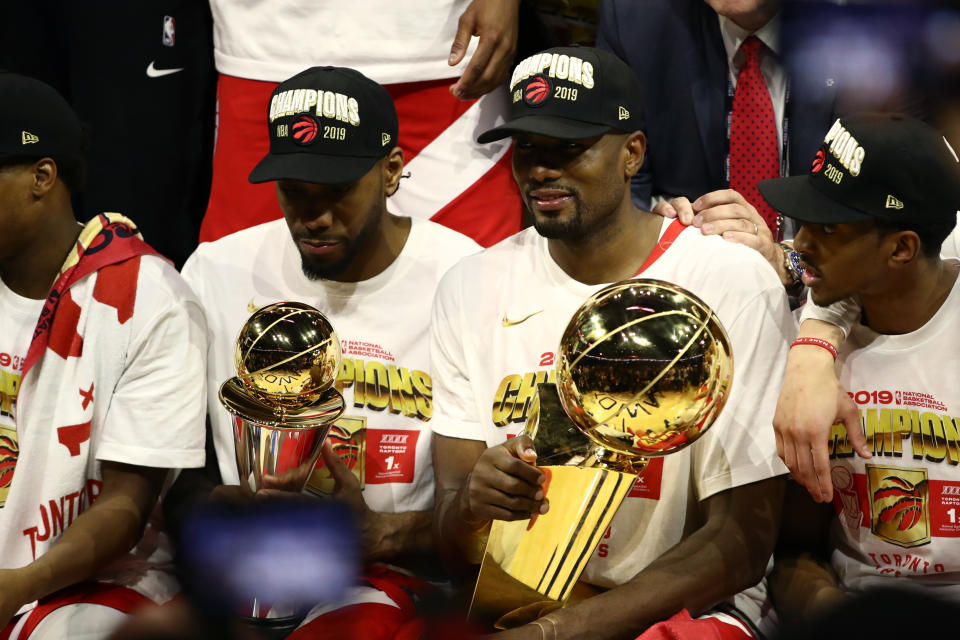 OAKLAND, CALIFORNIA - JUNE 13: The Toronto Raptors pose for a photo after their team defeated the Golden State Warriors to win Game Six of the 2019 NBA Finals at ORACLE Arena on June 13, 2019 in Oakland, California. NOTE TO USER: User expressly acknowledges and agrees that, by downloading and or using this photograph, User is consenting to the terms and conditions of the Getty Images License Agreement. (Photo by Ezra Shaw/Getty Images)