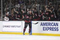 Ottawa Senators right wing Connor Brown (28) is congratulated for his goal against the Los Angeles Kings in the second period of an NHL hockey game Saturday, Nov. 27, 2021, in Los Angeles. (AP Photo/Kyusung Gong)