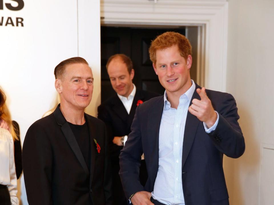 Bryan Adams with Prince Harry in 2014 (Getty Images)