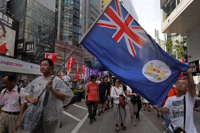 2018年7月1日，香港回歸中國21周年，香港泛民團體發起七一遊行，今年遊行主題是「結束一黨專政 拒絕香港沉淪」（AP）