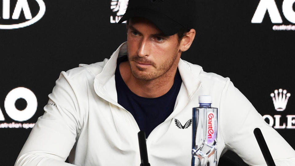 Andy Murray addresses media. (Photo by GREG WOOD/AFP/Getty Images)