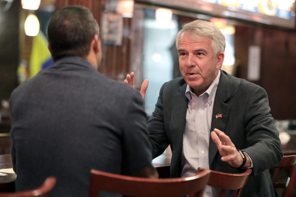 Essex County legislator Rolando Bobadilla, left, speaks with Hugin before a press conference announcing that Bobadilla was dropping his Democratic Party affiliation and endorsing Hugin, on Oct. 23, 2018, in Newark. (Photo: Julio Cortez/AP)