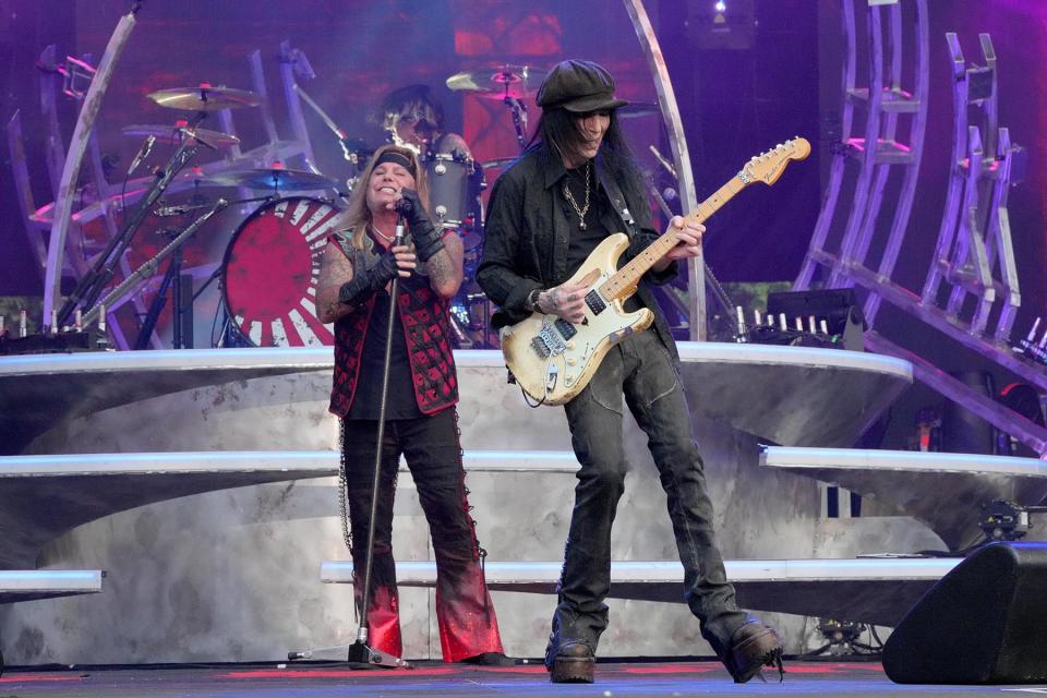 Vince Neil and Mick Mars of Mötley Crüe perform onstage during The Stadium Tour at Truist Park on June 16, 2022 in Atlanta, Georgia.
