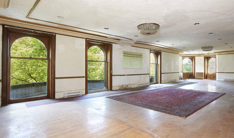 The Grand Ballroom on the 4th Floor includes floor-to-ceiling arched windows.
