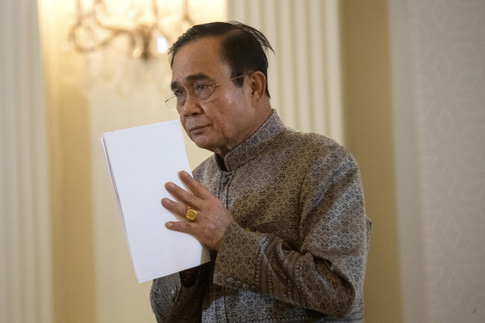 Thailand's Prime Minister Prayuth Chan-ocha greets after a press conference at Government house in Bangkok, Thailand, Tuesday, Sept. 1, 2020. A two-day rally planned for this weekend is jangling nerves in Bangkok, with apprehension about how far student demonstrators will go in pushing demands for reform of Thailand’s monarchy and how the authorities might react. More than 10,000 people are expected to attend the Saturday-Sunday event. (AP Photo/Sakchai Lalit)