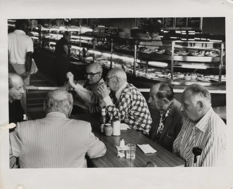 In 1979 at the Concord Cafeteria in South Beach, the Ring Boxing 31 Club discusses the sport. Bob East/Miami Herald File