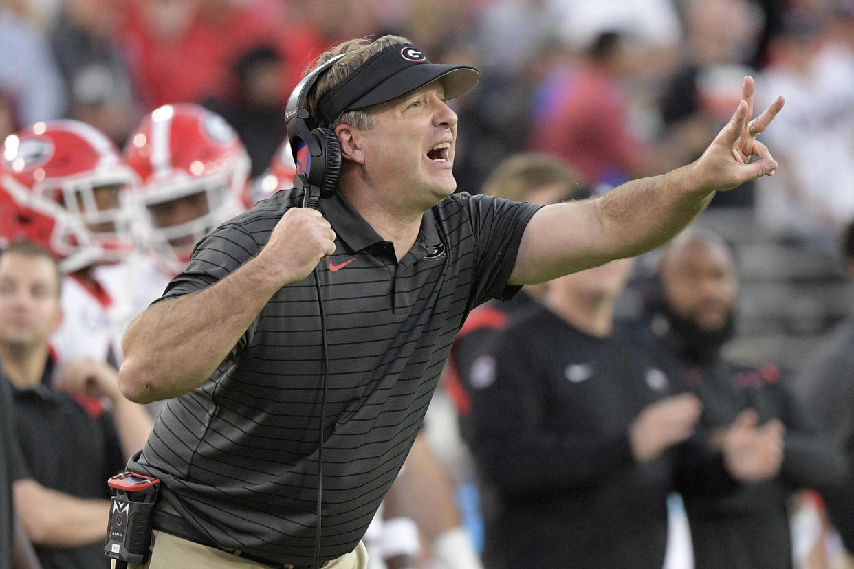 FILE - Georgia head coach Kirby Smart calls out instructions from the sideline during the second half of an NCAA college football game against Florida, Saturday, Oct. 30, 2021, in Jacksonville, Fla. Smart was selected to The Associated Press All-SEC team in results released Wednesday, Dec. 8, 2021. (AP Photo/Phelan M. Ebenhack, File)