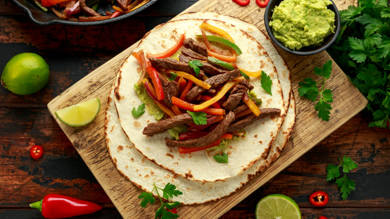 Steak fajitas with guacamole