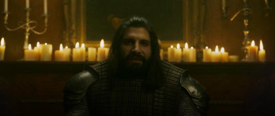 Nandor in his armor talking to the camera in "What We Do in the Shadows"