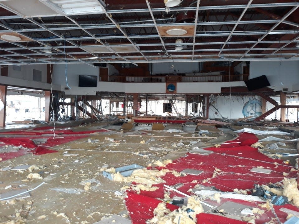 Hurricane Ian badly damaged Fort Myers Beach's oldest church, Chapel By The Sea. Now its members meet at Cypress Lake Presbyterian Church in south Fort Myers.