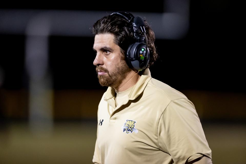 Buchholz Bobcats head coach Chuck Bell walks off the field during the first half against the Lakeland Dreadnaughts in the Semifinals of the 2023 FHSAA Football State Championships at Citizens Field in Gainesville, FL on Friday, December 1, 2023. [Matt Pendleton/Gainesville Sun]