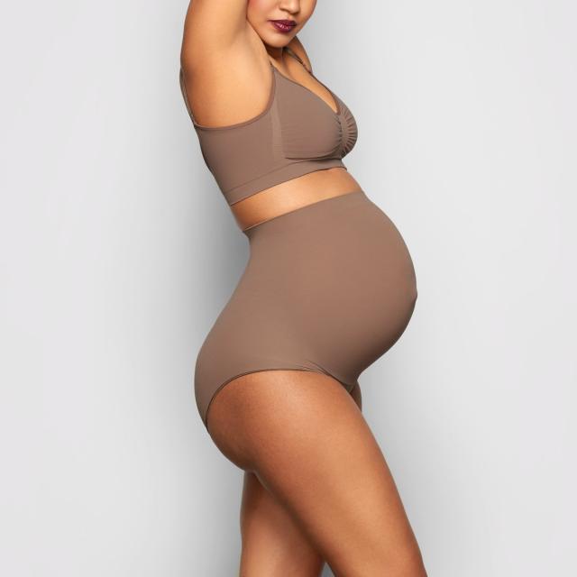 I gave birth four months ago & tried on the viral Skims shapewear - it gets  rid of my bulge & makes me look so snatched
