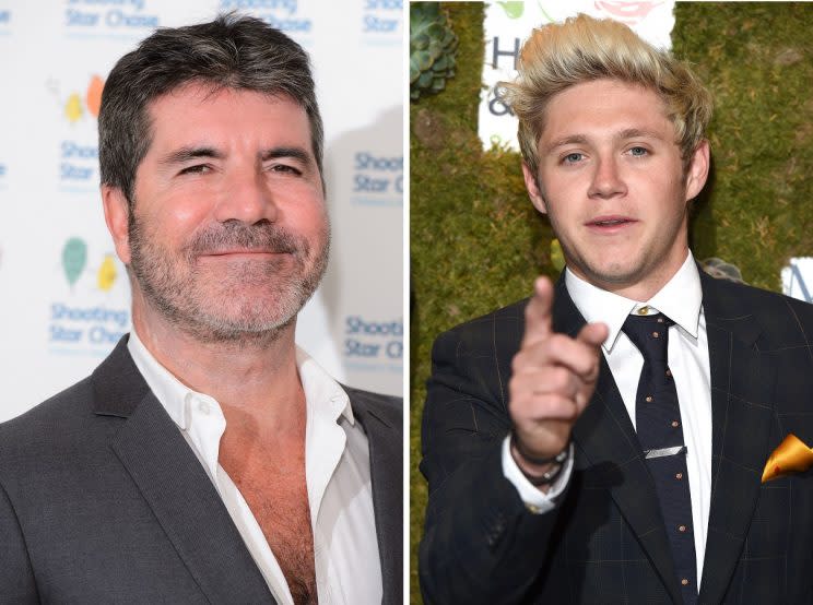Simon is NOT happy with Niall Copyright: Rex