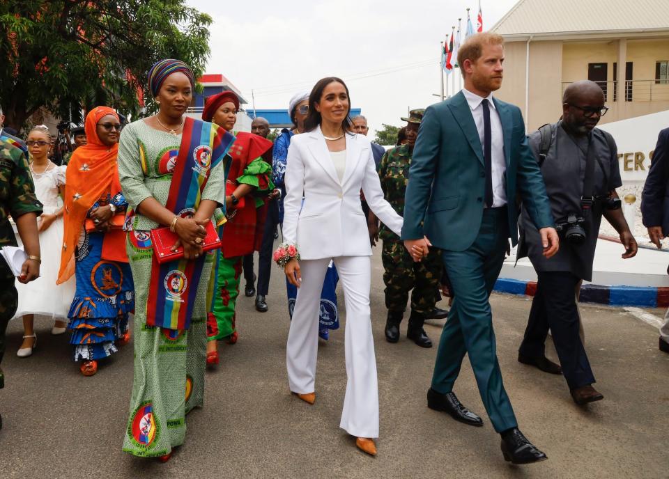 Prince Harry and Meghan Markle at the Defence Headquarters in Abuja, Nigeria, in May 2024.