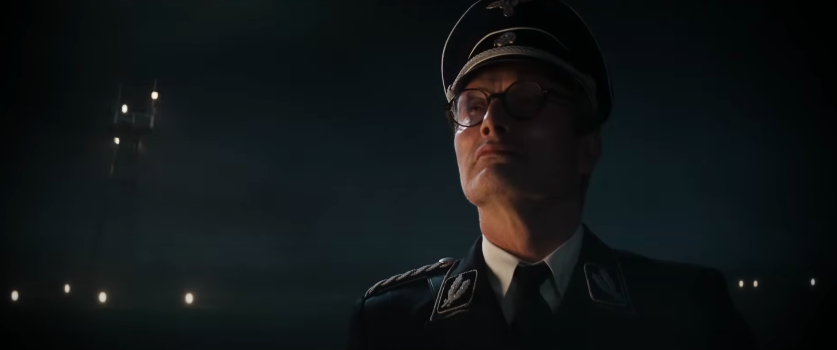 Close-up of Mads Mikkelsen wearing a military uniform