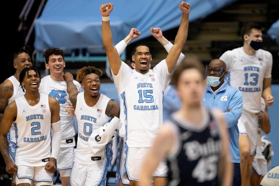 North Carolina’s Garrison Brooks (15) and his teammates reacts as time expires and they celebrate their 91-73 victory over Duke on Saturday, March 6, 2021 at the Smith Center in Chapel Hill, N.C.