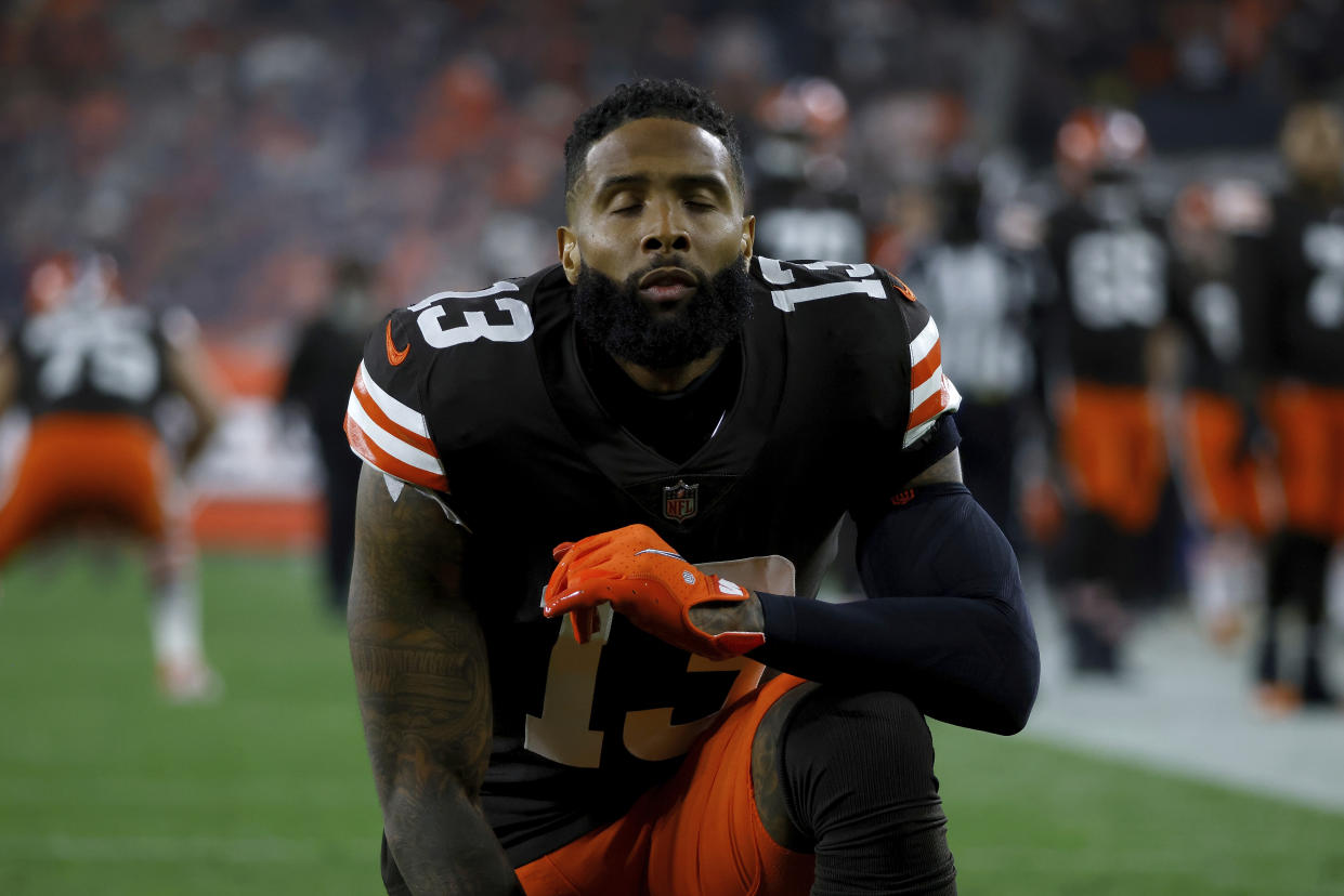Cleveland Browns wide receiver Odell Beckham Jr. (13) kneels in the end zone prior to the start of an NFL football game against the Denver Broncos, Thursday, Oct. 21, 2021, in Cleveland. (AP Photo/Kirk Irwin)