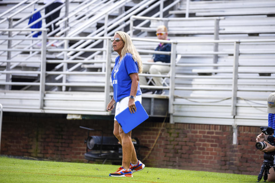 This photo provided by UAA Communications shows Florida coach Amanda O'Leary coaching against Virginia in the second round of the NCAA women's lacrosse tournament, Sunday, May 12, 2024, in Charlottesville, Va. After 15 seasons and 17 years with the Gators, O’Leary has a chance to secure her coaching legacy when Florida plays in the women’s championships for the second time in school history and the first time since 2012. (UAA Communications/Keith Lucas)