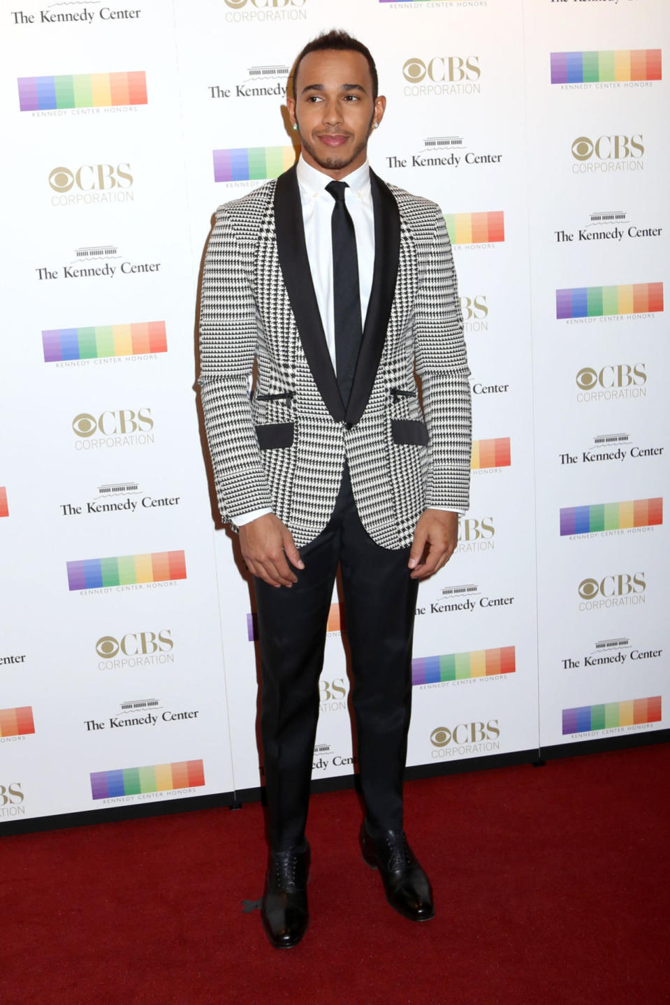 Lewis Hamilton in a houndstooth jacket at the 38th Annual Kennedy Center Honors at The Kennedy Center Hall of States in Washington, DC.