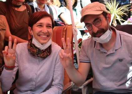 Nuriye Gulmen, a literature professor, and Semih Ozakca, a primary school teacher, who have been on hunger strike after they both lost their jobs in a crackdown following a failed July coup against President Tayyip Erdogan, take part in a protest against a government purge in Ankara, Turkey, May 11, 2017.  REUTERS/Stringer