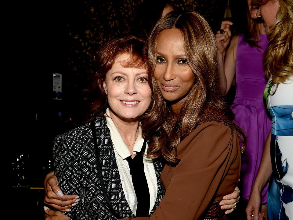 Susan poses with Iman at an event