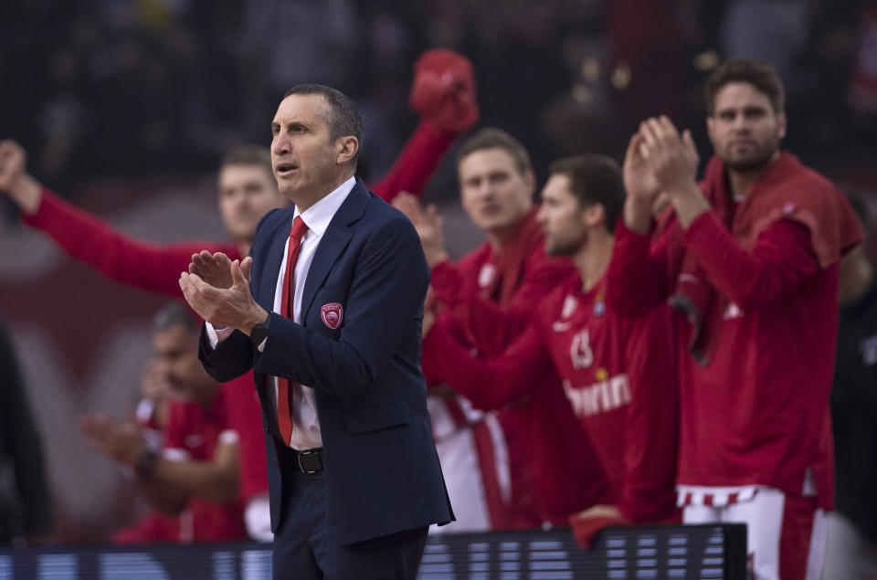 Olympiakos coach David Blatt celebrates a point during a Euroleague basketball match between Panathinaikos and Olympiakos in Piraeus near Athens, on Friday, Jan. 4, 2019. (AP Photo/Petros Giannakouris)