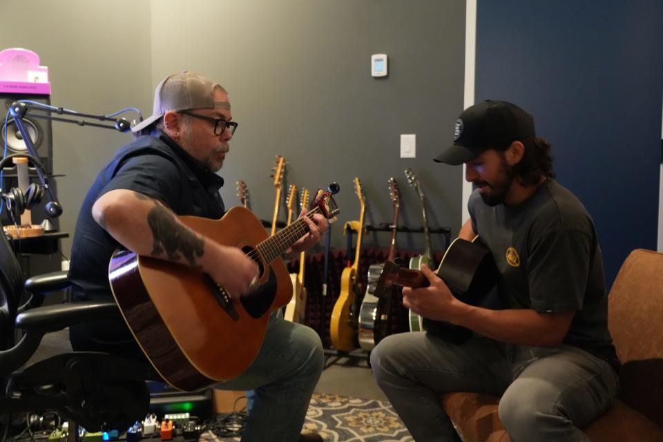 Producer and songwriter Mike Fiorentino (left) writes with songwriter Cale Dodds at Spirit Music Nashville's office. The two recently wrote a song for a RAM truck commercial and the current Chevy Silverado campaign.