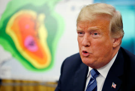 U.S. President Donald Trump speaks during an Oval Office meeting on hurricane preparations for Hurricane Florence at the White House in Washington, U.S., September 11, 2018. REUTERS/Leah Millis