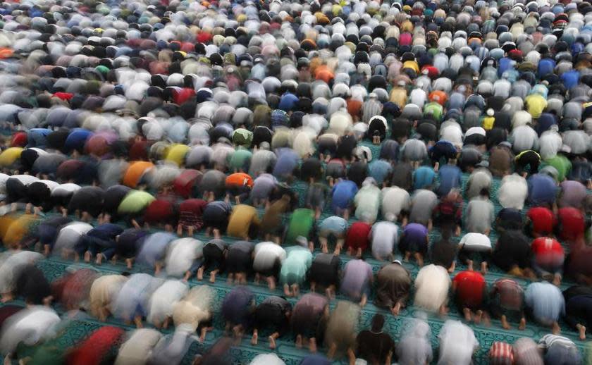 Muslims perform Friday prayers at a mosque in Sepang on August 2, 2013. — Reuters pic