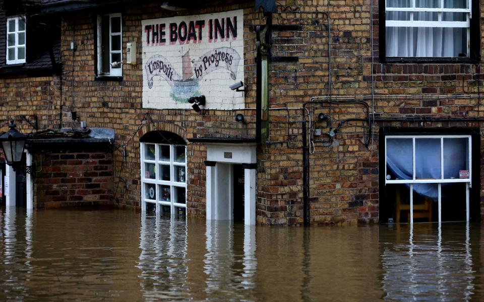 The pub landlord estimates that the floodwater has risen to around 4ft