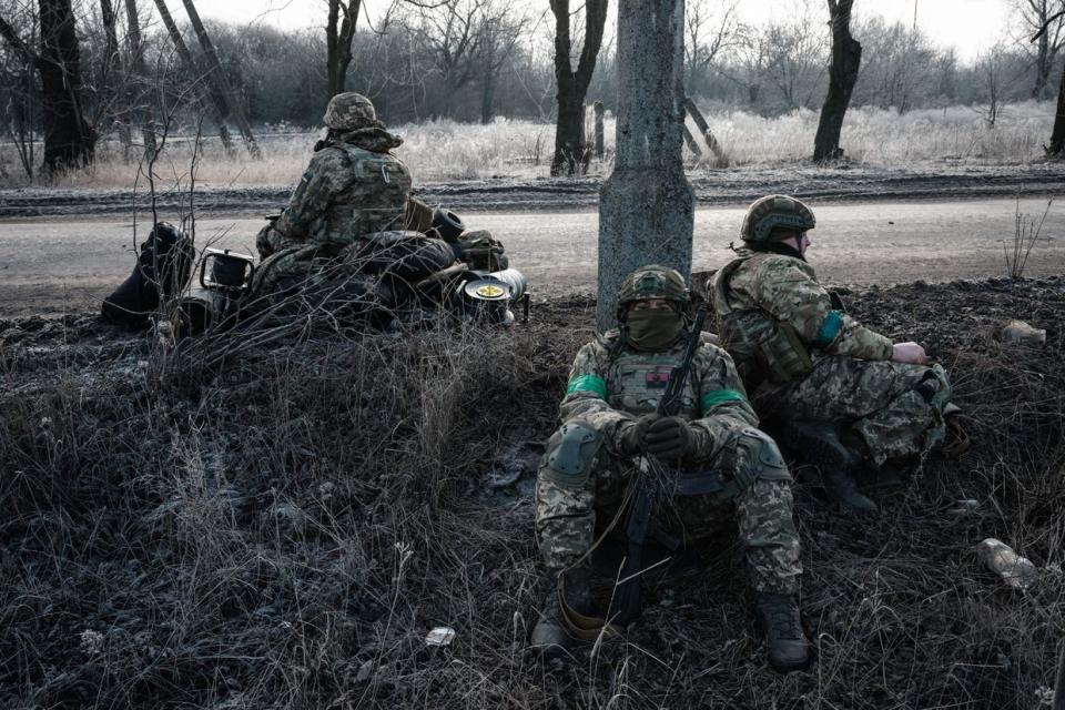 Ukrainian paratroopers wait for transport along the road in Chasiv Yar, Donetsk Oblast, on Jan. 28, 2023, amid the Russian invasion of Ukraine. (Yasuyoshi Chiba / AFP via Getty Images)