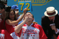 <p>Winner Joey Chestnut competes in the final seconds of Nathan’s Famous Fourth of July International Hot Dog-Eating Contest at Coney Island in Brooklyn, New York City, U.S., July 4, 2017. (Andrew Kelly/Reuters) </p>