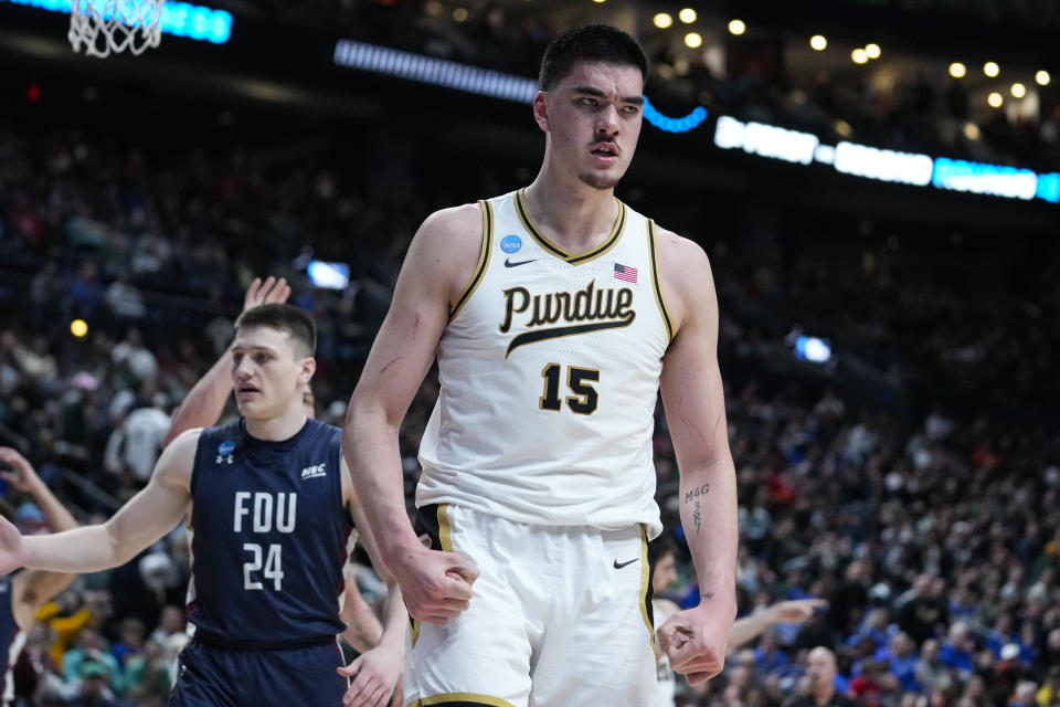 Purdue center Zach Edey (15) reacts after being fouled by Fairleigh Dickinson in the second half of a first-round college basketball game in the men's NCAA Tournament in Columbus, Ohio, Friday, March 17, 2023. (AP Photo/Michael Conroy)