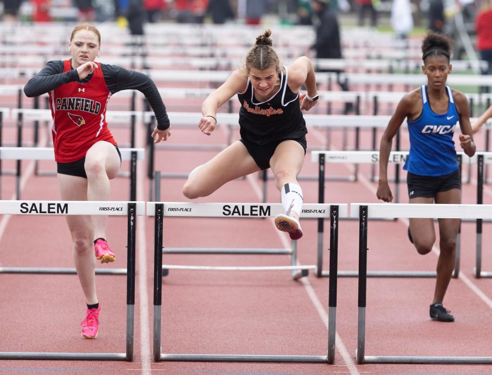 Marlington's Elizabeth Mason wins the 100-meter hurdles at this year's Division II district track and field meet in Salem.