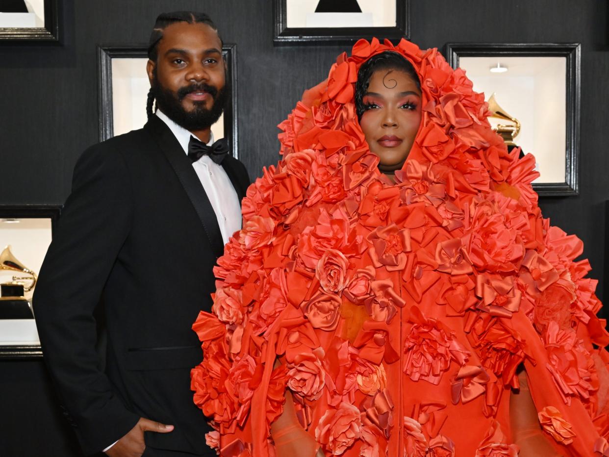 Myke Wright and Lizzo attend the 65th GRAMMY Awards on February 05, 2023 in Los Angeles, California.