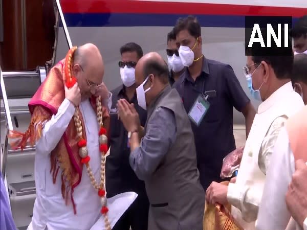 Union Home Minister Amit Shah greeted by Karnataka CM Basavaraj Bommai. (Photo/ANI)