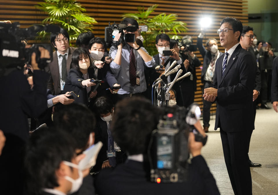 Japan's World Baseball Classic (WBC) team manager Hideki Kuriyama, right, speaks to journalists after meeting Japanese Prime Minister Fumio Kishida at the latter's official residence in Tokyo, Japan, Thursday, March 23, 2023. Japan won over the U.S. at the WBC final Tuesday.(Kimimasa Mayama/Pool Photo via AP)