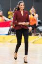 <p><strong>October 2018 </strong>The Duchess of Sussex attended the Wheelchair Basketball final at the Invictus Games in a Scanlan Theodore wrap top and fitted trousers.</p>