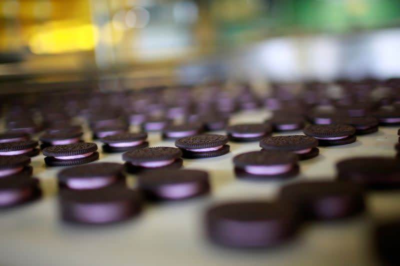 FILE PHOTO: Oreo cookies pass along a conveyor belt at a factory in Suzhou,