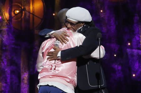 32nd Annual Rock & Roll Hall of Fame Induction Ceremony - Show – New York City, U.S., 07/04/2017 – Inductee Nile Rodgers and presenter Pharrell Williams. REUTERS/Lucas Jackson