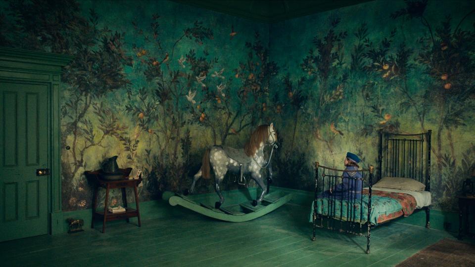 For Mary’s bedroom, the film’s production designer Grant Montgomery was inspired by the muralist Rex Whistler. Doing double duty as set decorator, he also designed the life-size rocking horse.