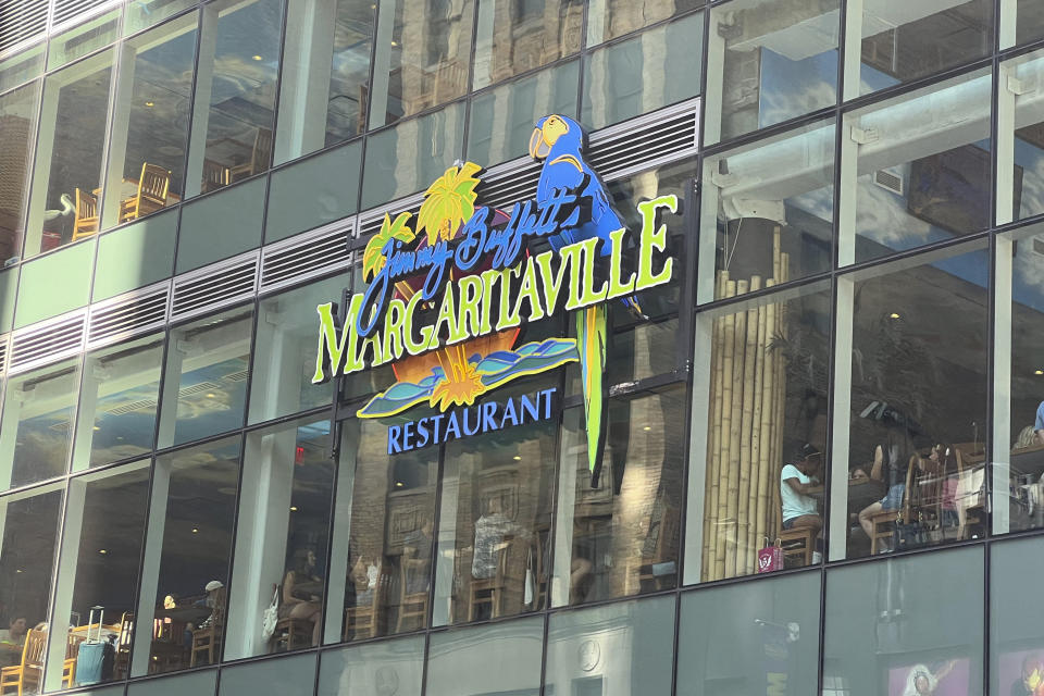 A sign is displayed for the Margaritaville restaurant in New York's Times Square on Saturday, Sept. 2, 2023, following news of the death of Jimmy Buffett. (AP Photo/Bobby Caina Calvan)